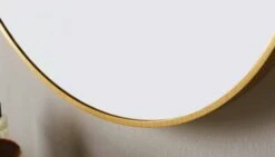 Docklands 600mm Brushed Brass Round Framed Mirror - Origins Living -Burlington Bath Shop B375523 docklands round mirror 60 brushed brass frame closeup