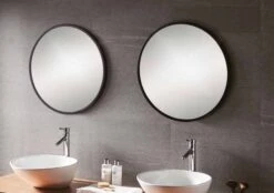 Docklands 600mm Matt Black Round Framed Mirror - Origins Living -Burlington Bath Shop B375530 docklands round mirror 60 black frame lifestyle 1